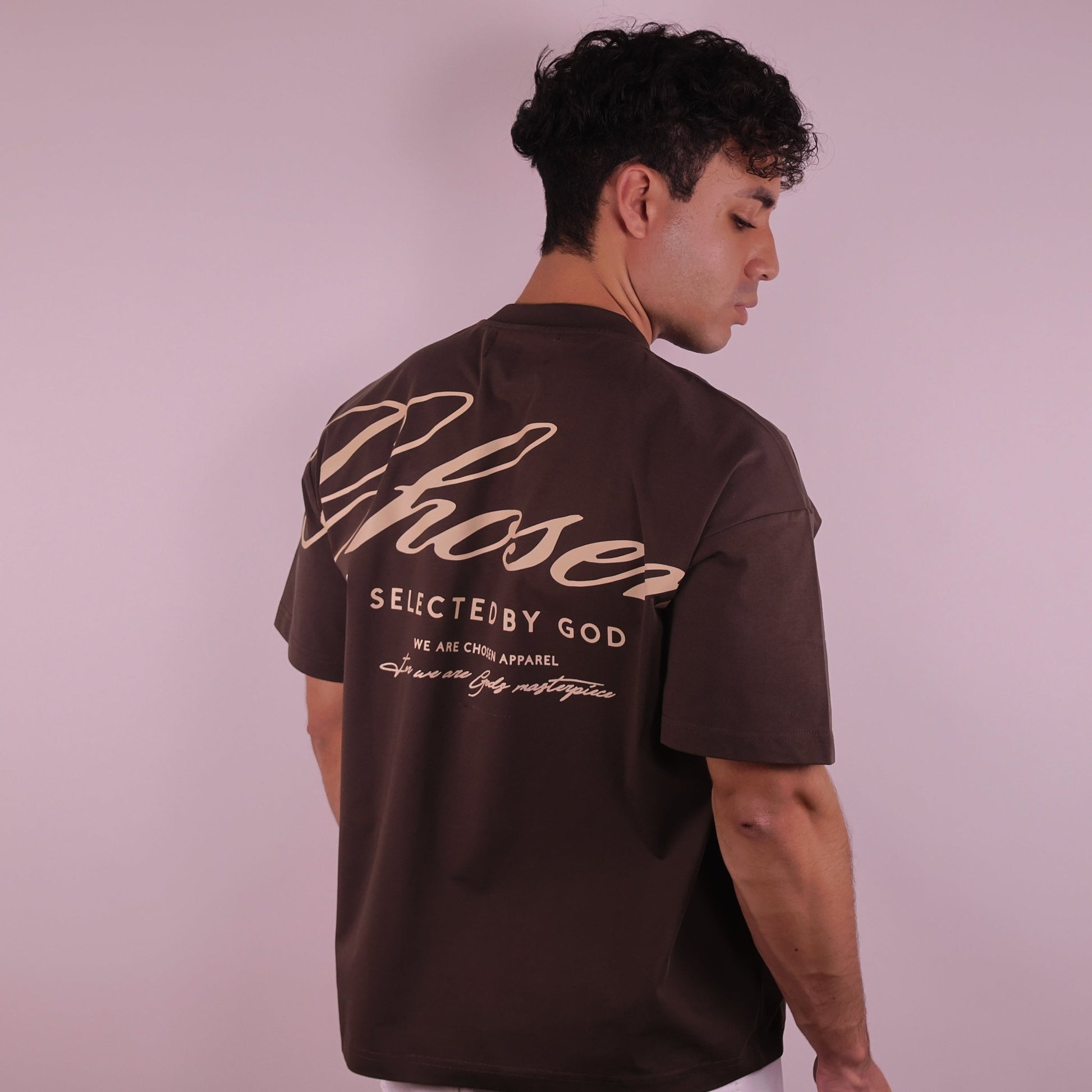 Close-up of 'We Are His Masterpiece' script on a forest green hoodie from We Are Chosen Apparel, inspired by Ephesians 2:10 - wearechosenapparel- 20% off all We Are Chosen Apparel hoodie