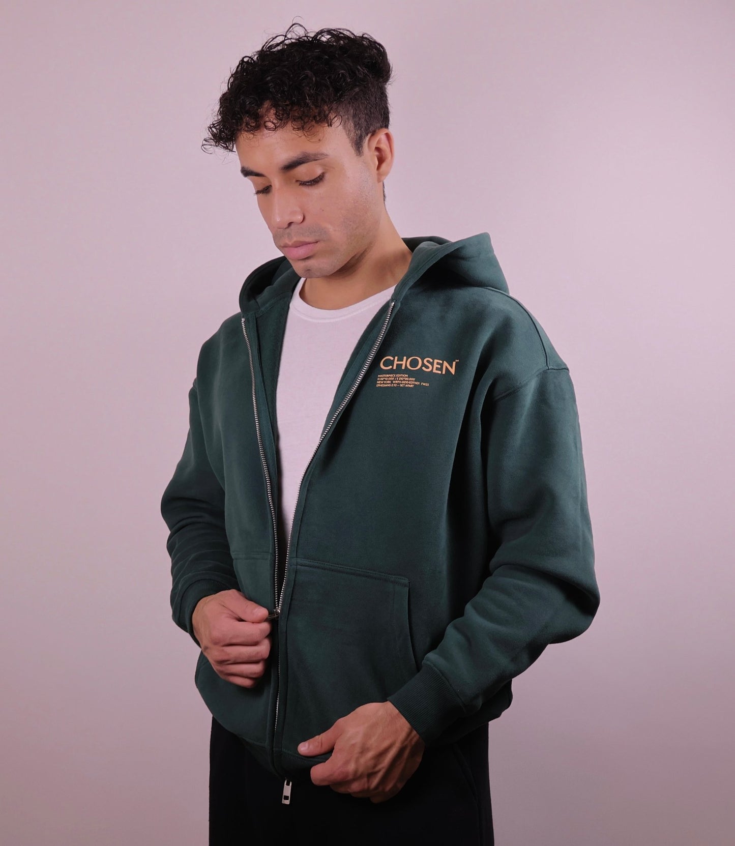 Close - up of 'We Are His Masterpiece' script on a forest green hoodie from We Are Chosen Apparel, inspired by Ephesians 2:10 - wearechosenapparel - 20% off all We Are Chosen Apparel hoodie