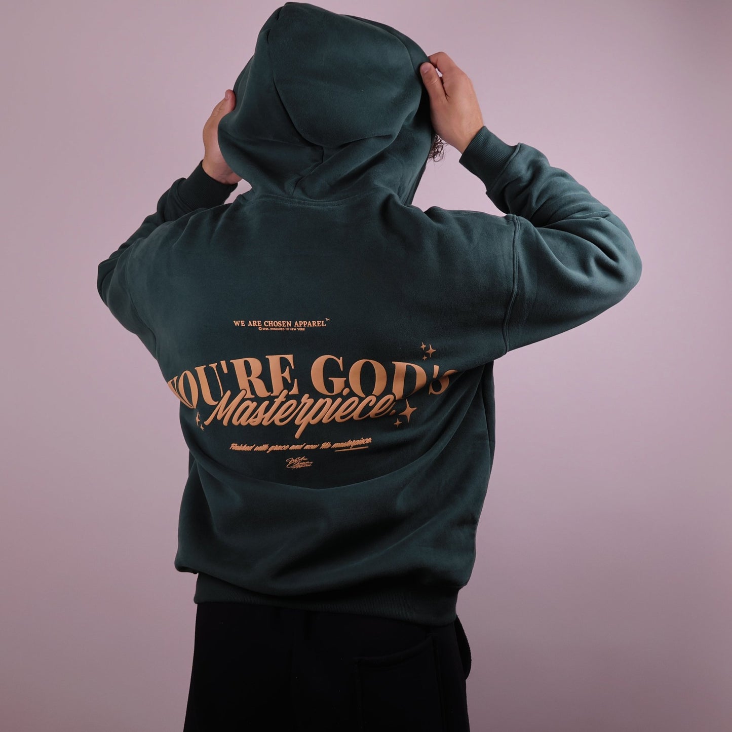 Close - up of 'We Are His Masterpiece' script on a forest green hoodie from We Are Chosen Apparel, inspired by Ephesians 2:10 - wearechosenapparel - 20% off all We Are Chosen Apparel hoodie