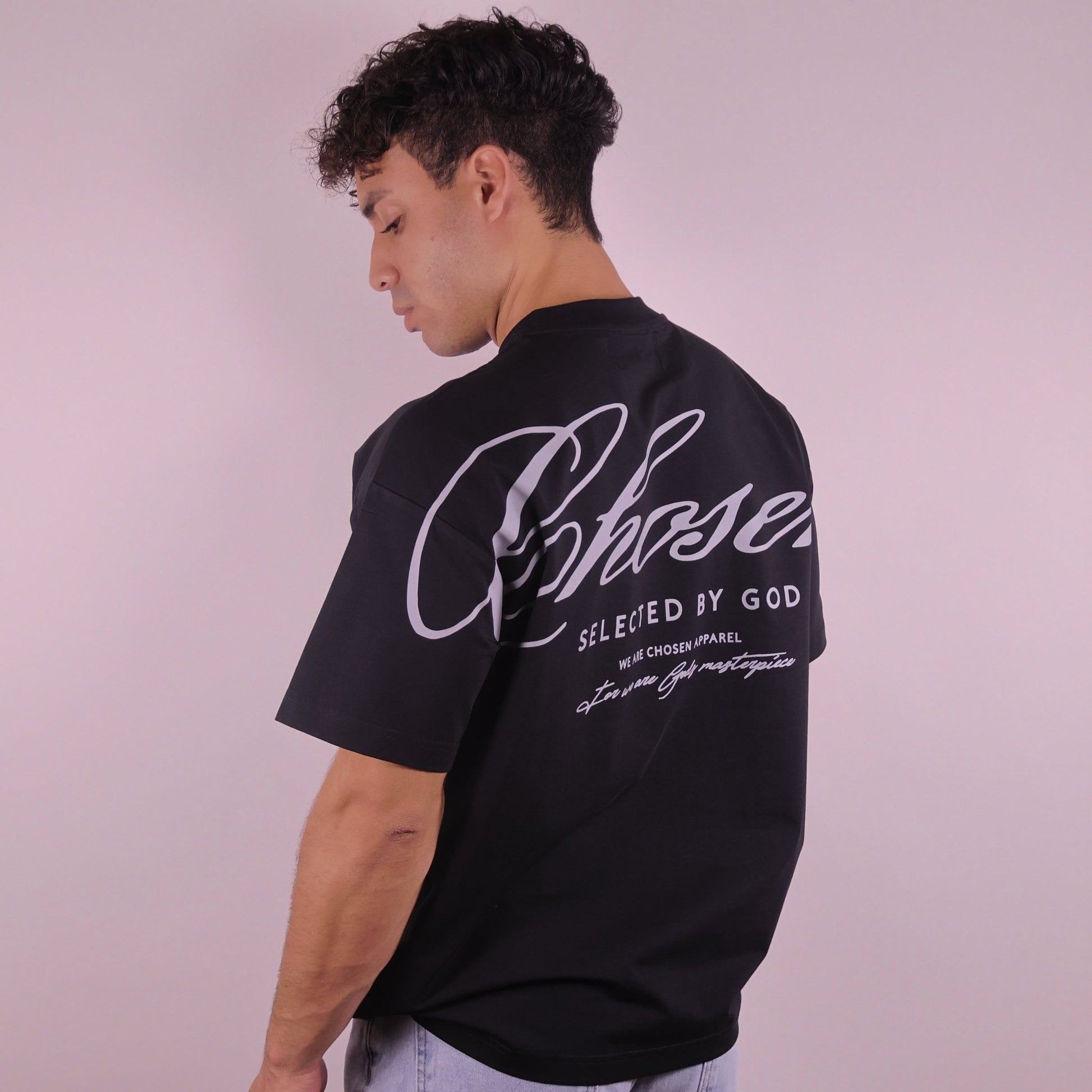 Close-up of 'We Are His Masterpiece' script on a forest green hoodie from We Are Chosen Apparel, inspired by Ephesians 2:10 - wearechosenapparel- 20% off all We Are Chosen Apparel hoodie