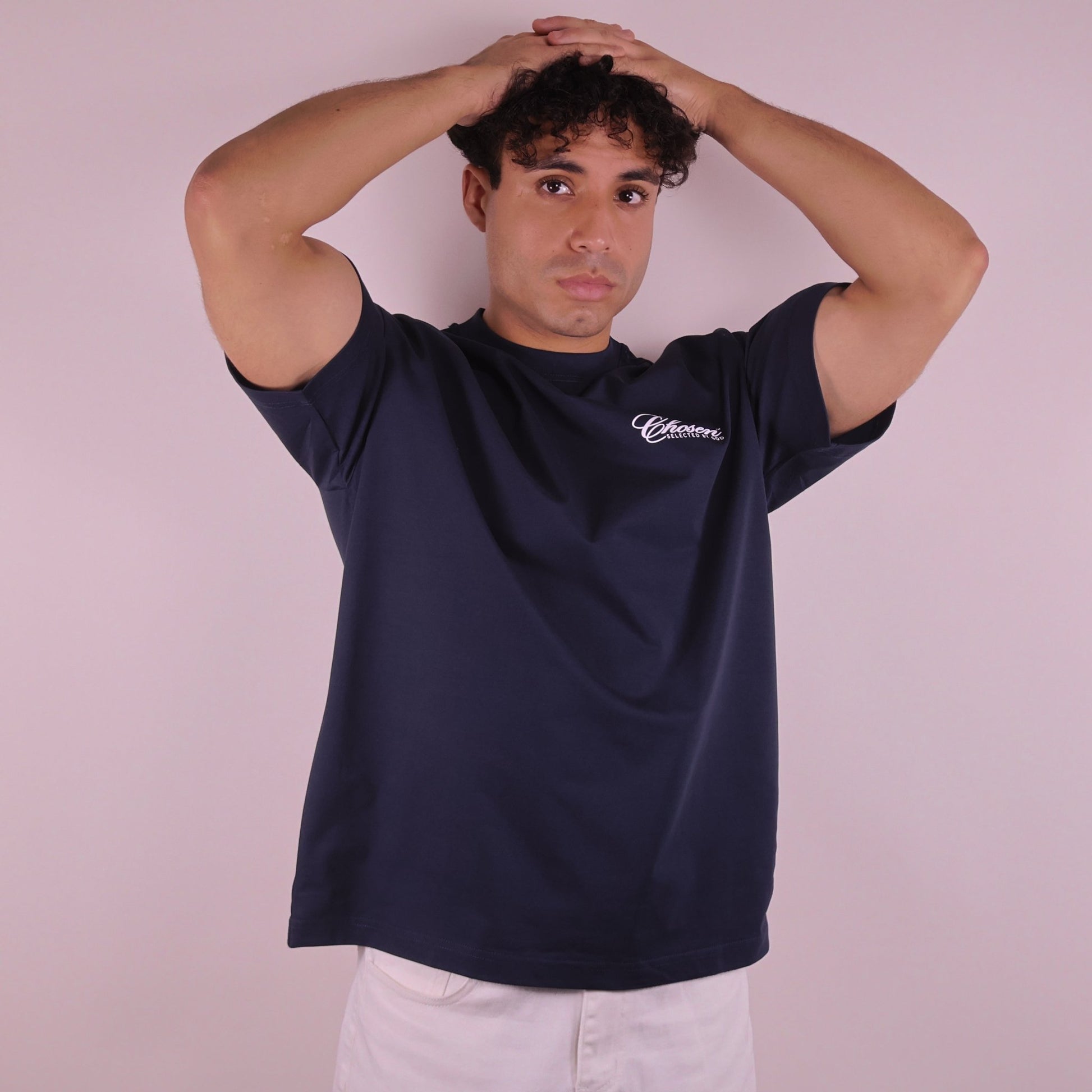 Close-up of 'We Are His Masterpiece' script on a forest green hoodie from We Are Chosen Apparel, inspired by Ephesians 2:10 - wearechosenapparel- 20% off all We Are Chosen Apparel hoodie