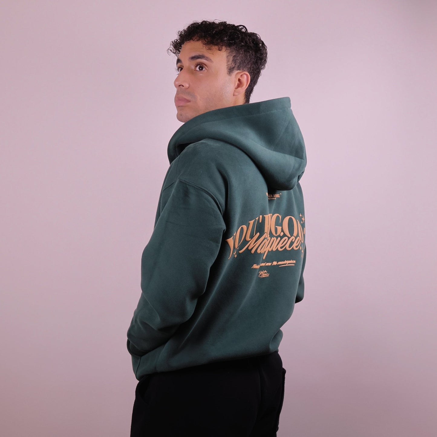 Close - up of 'We Are His Masterpiece' script on a forest green hoodie from We Are Chosen Apparel, inspired by Ephesians 2:10 - wearechosenapparel - 20% off all We Are Chosen Apparel hoodie