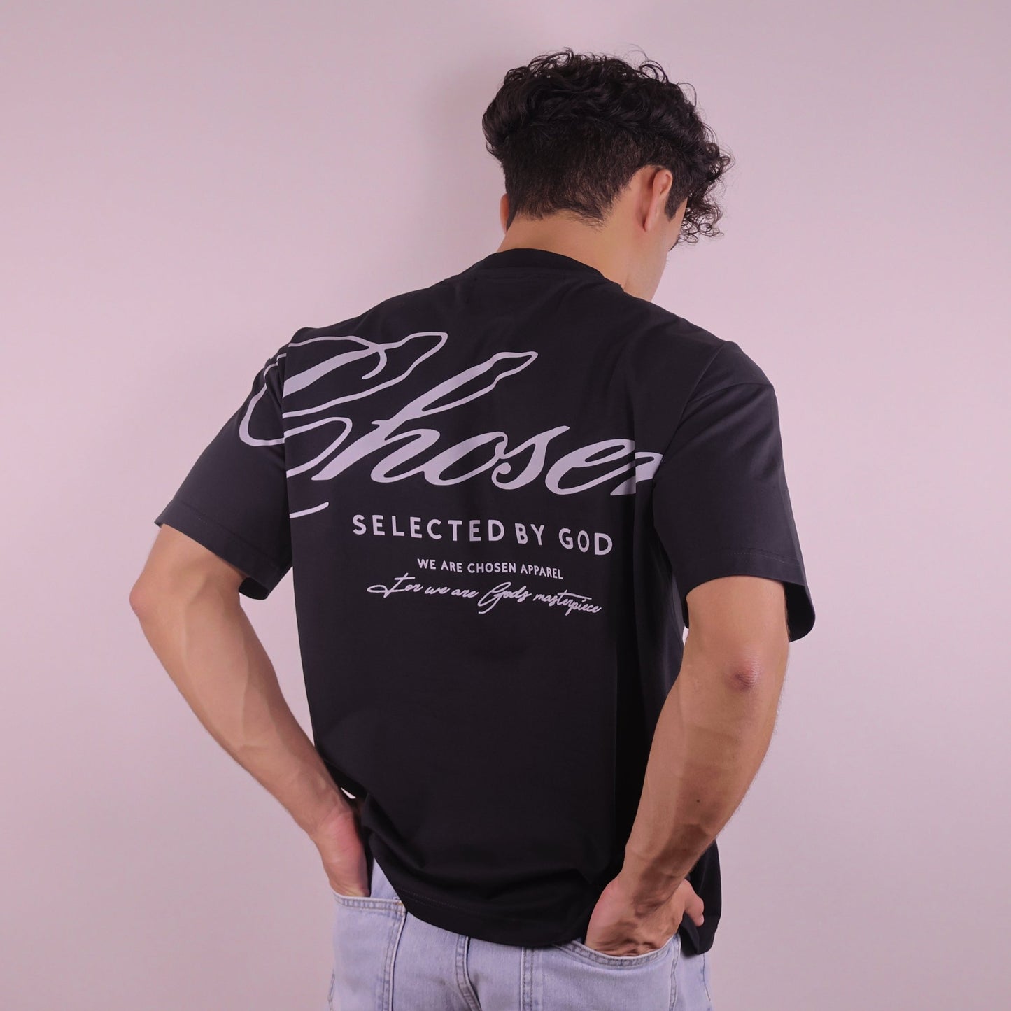 Close-up of 'We Are His Masterpiece' script on a forest green hoodie from We Are Chosen Apparel, inspired by Ephesians 2:10 - wearechosenapparel- 20% off all We Are Chosen Apparel hoodie