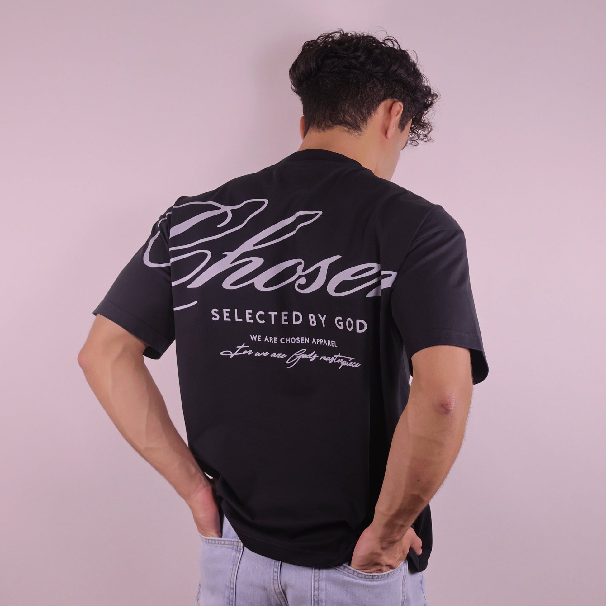 Close-up of 'We Are His Masterpiece' script on a forest green hoodie from We Are Chosen Apparel, inspired by Ephesians 2:10 - wearechosenapparel- 20% off all We Are Chosen Apparel hoodie