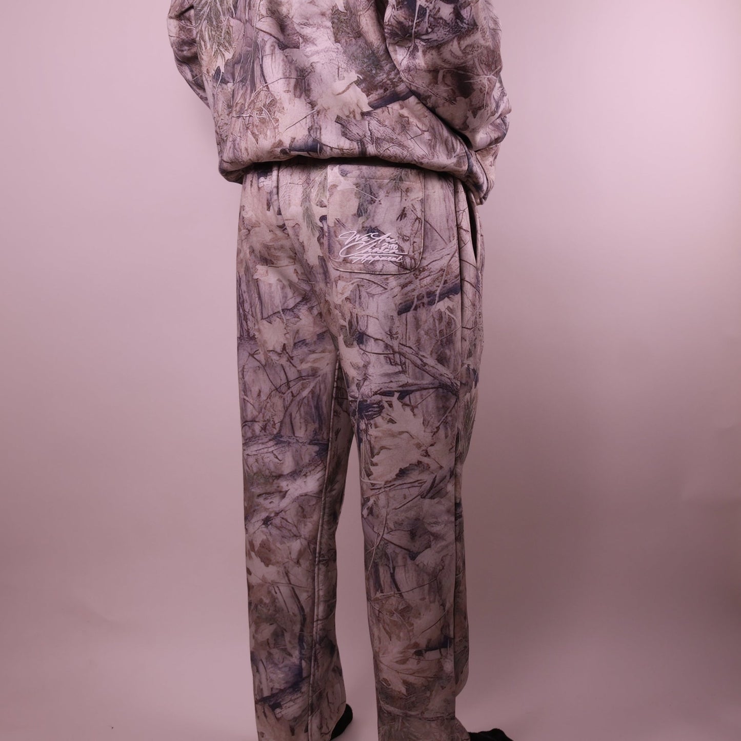 Camouflage tracksuit on a plain background