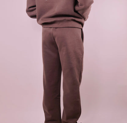Brown tracksuit on a plain background