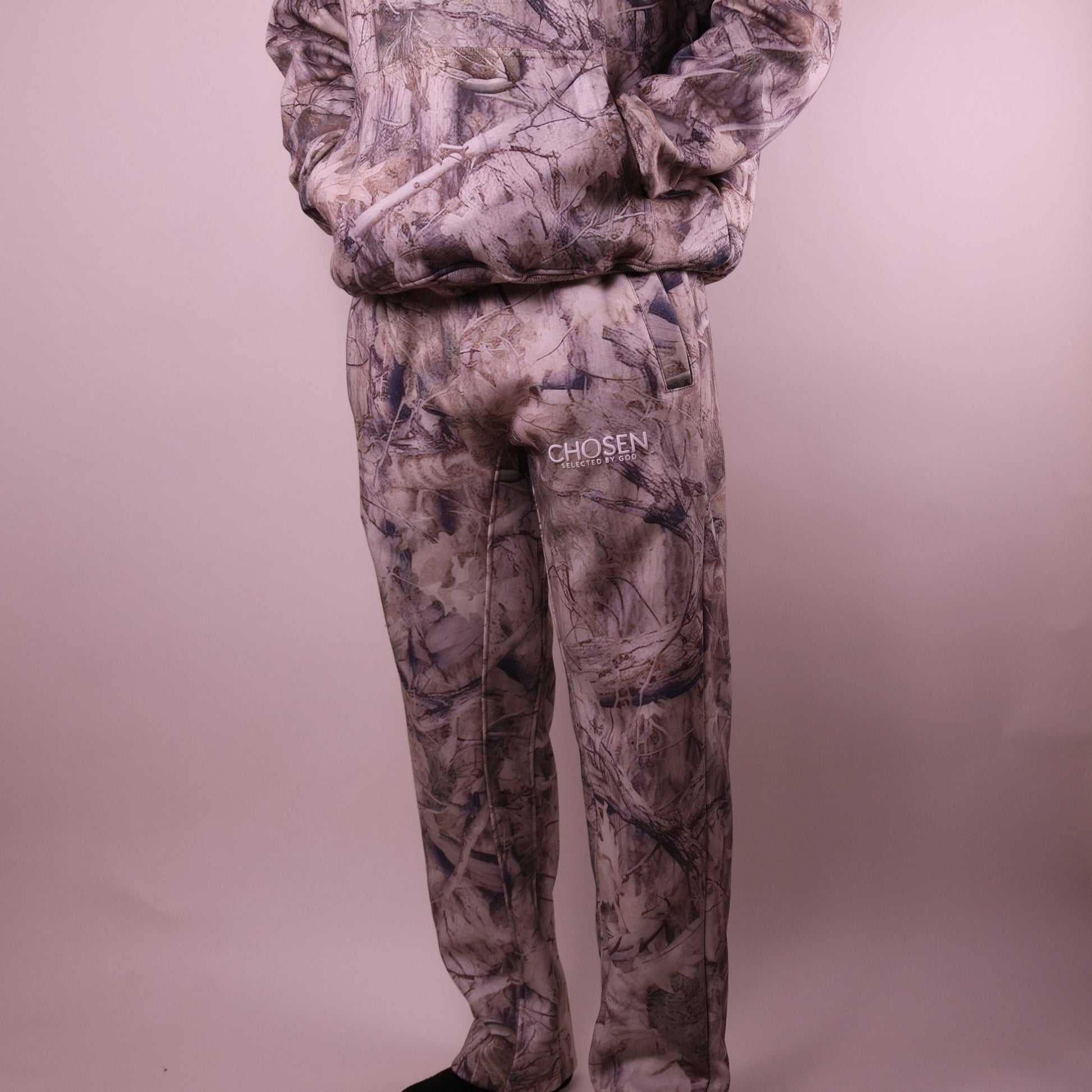 Camouflage outfit with Chosen branding on a plain background
