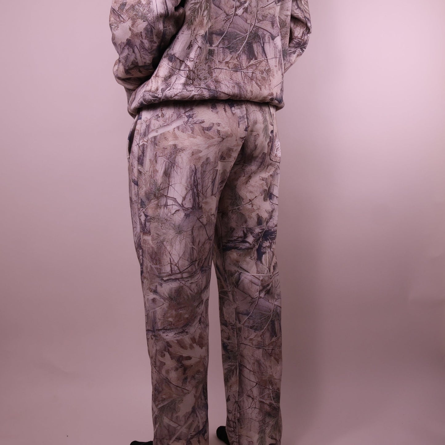 Camouflage tracksuit on a plain background