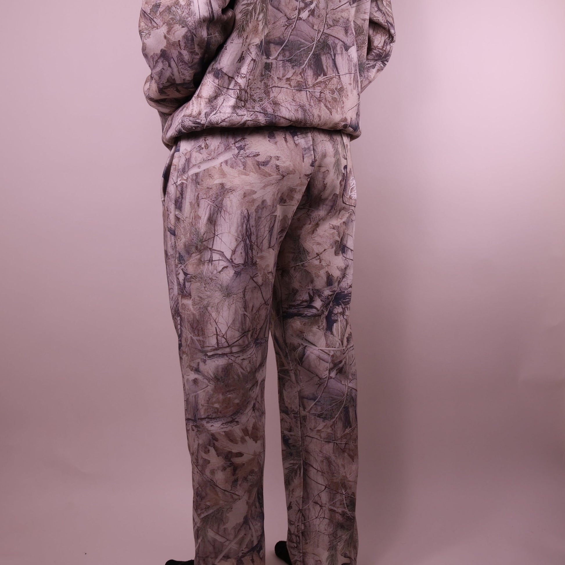 Camouflage tracksuit on a plain background