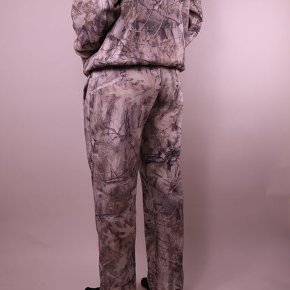 Camouflage tracksuit on a plain background