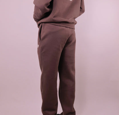 Brown tracksuit on a plain background